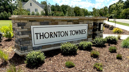 8640 Brixton Shay Drive Raleigh, NC 27616 - Photo 20 of 21 a view of sign board with yard