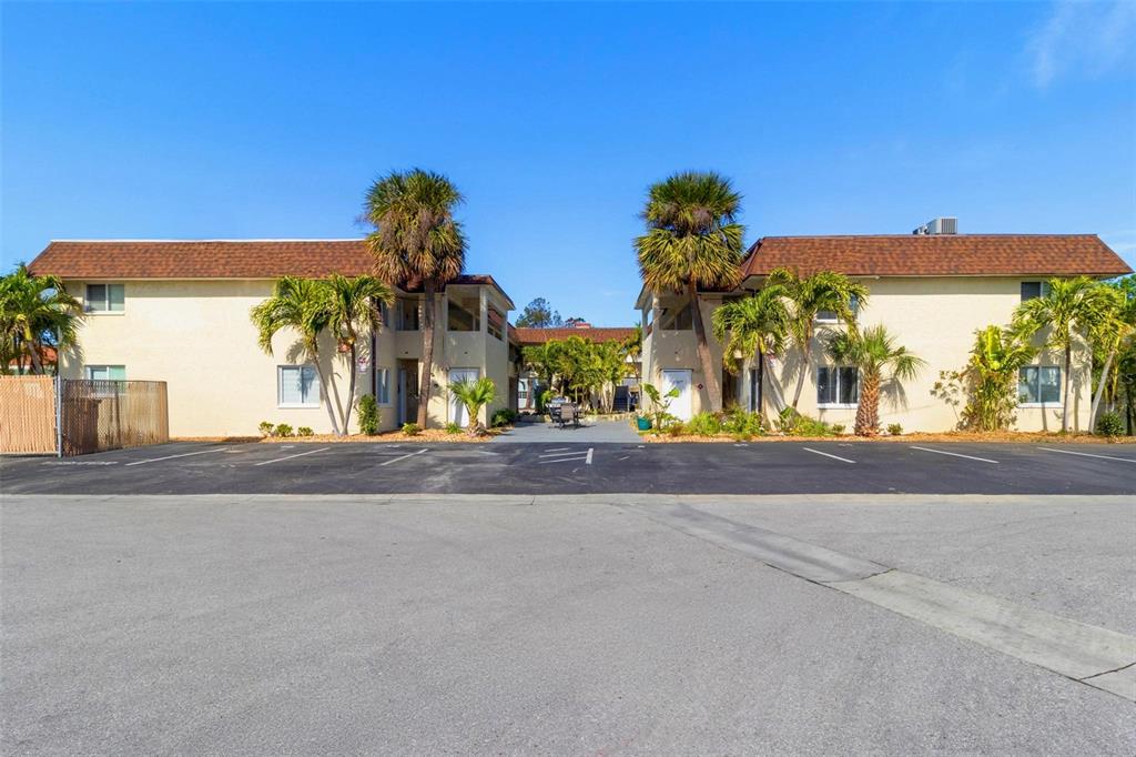 2704 2nd Street, Unit 2 Indian Rocks Beach, FL 33785 - Photo 19 of 32 front view of a house with a street