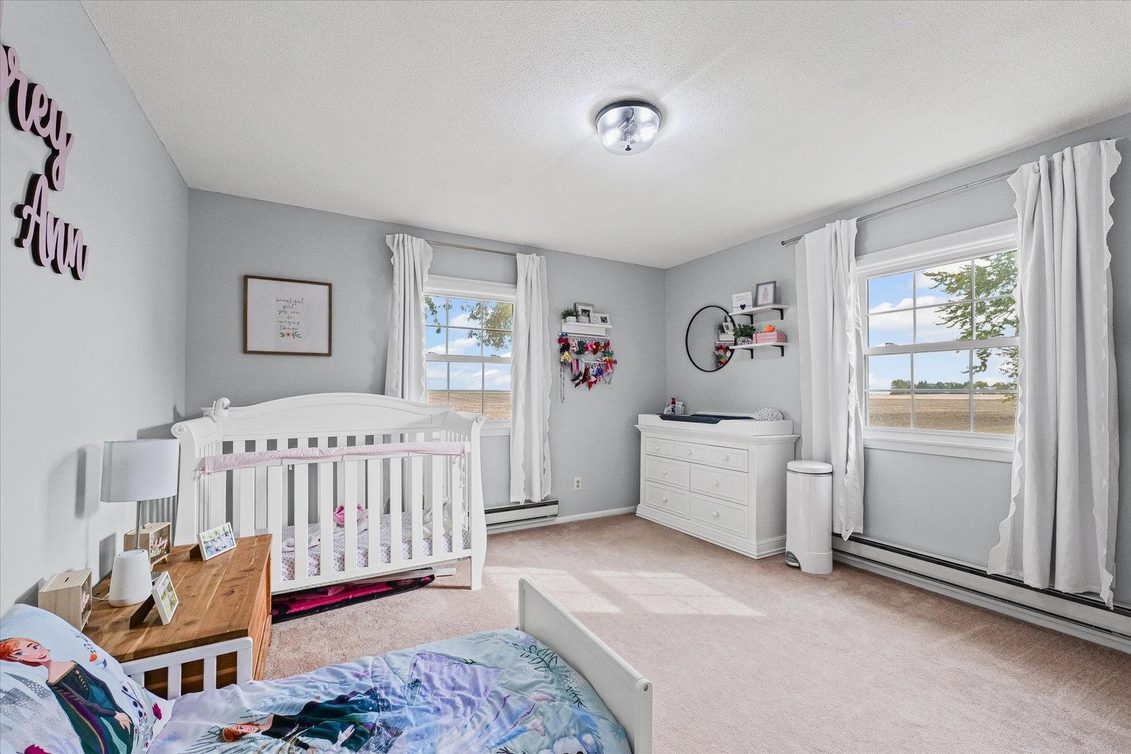 407 Church Street Royal, IL 61871 - Photo 21 of 31 a bedroom with furniture and a window