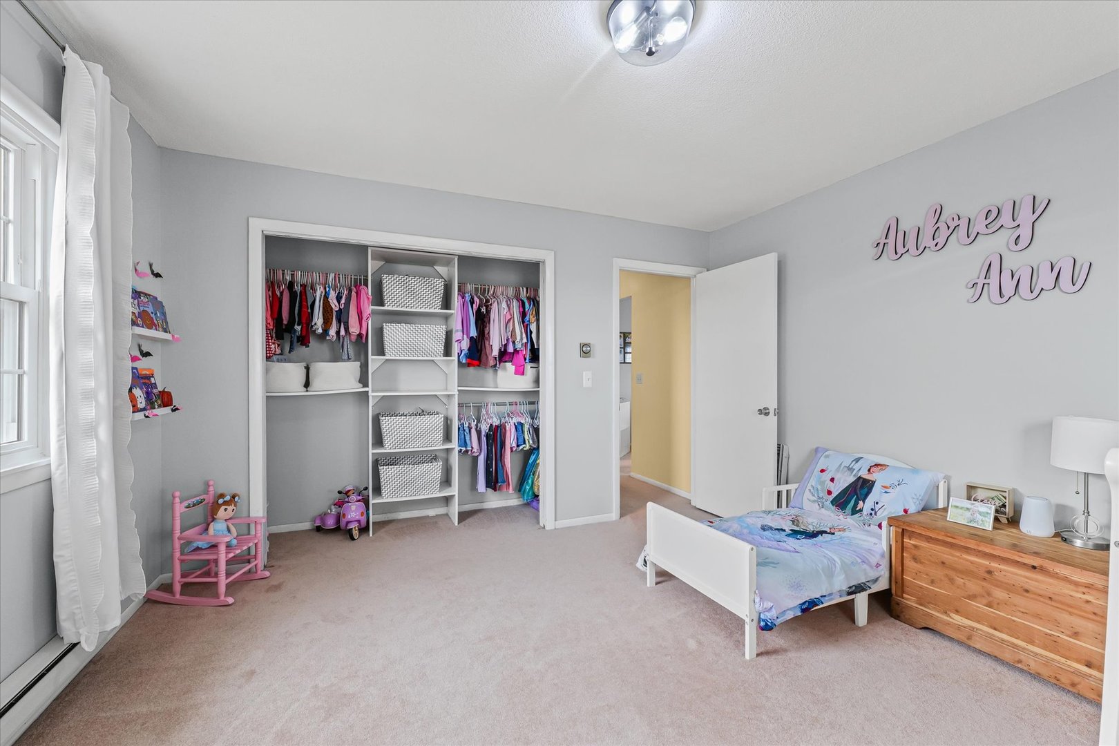 407 Church Street Royal, IL 61871 - Photo 23 of 31 a bedroom with furniture and a chandelier