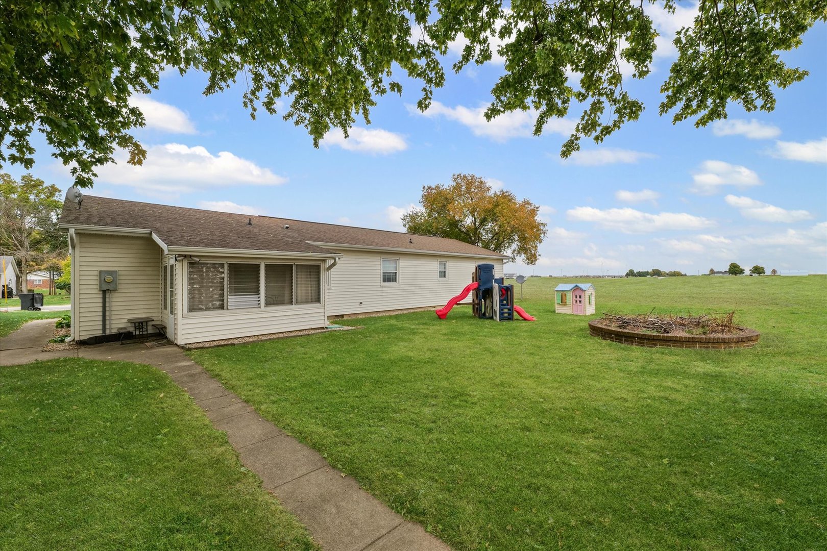 407 Church Street Royal, IL 61871 - Photo 28 of 31 a view of a house with a backyard