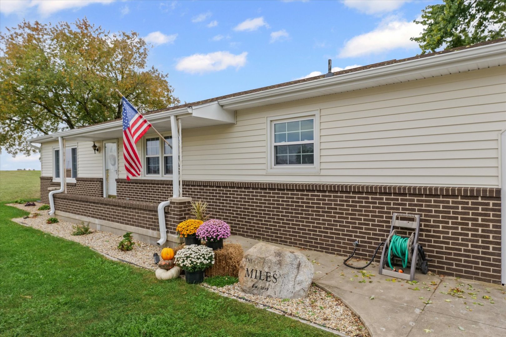407 Church Street Royal, IL 61871 - Photo 4 of 31 a backyard of a house with seating space