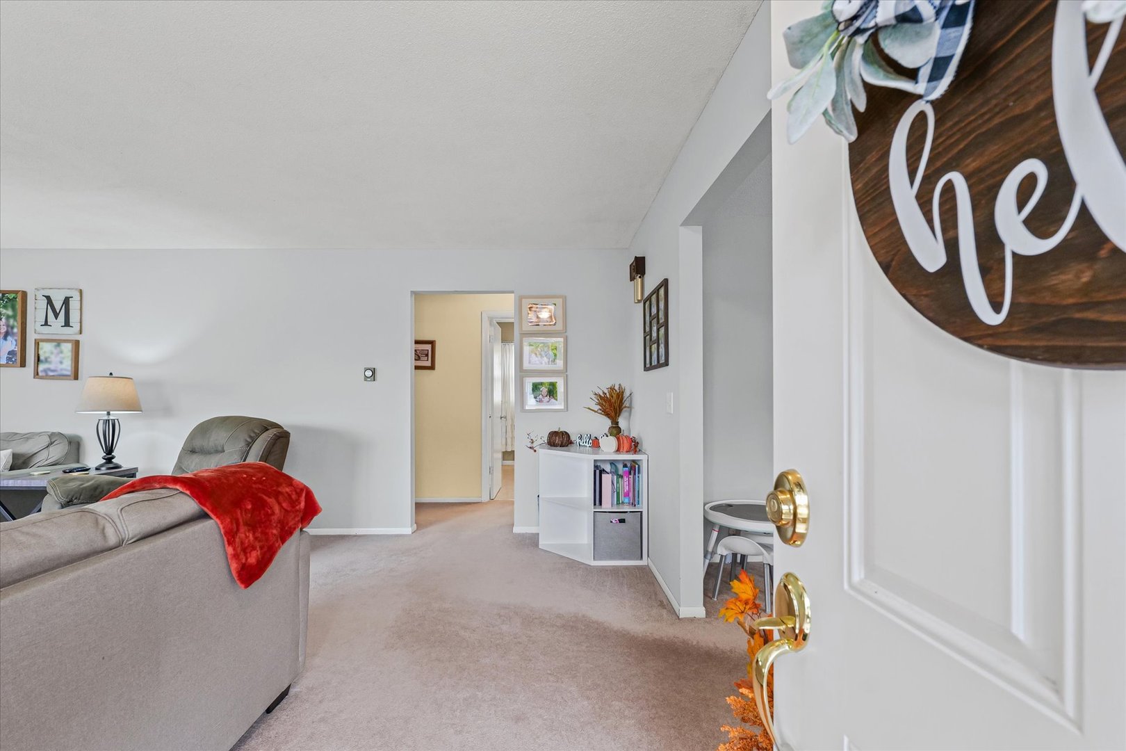 407 Church Street Royal, IL 61871 - Photo 5 of 31 a bedroom with a bed and a couch