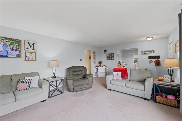 a living room with furniture and a couch
