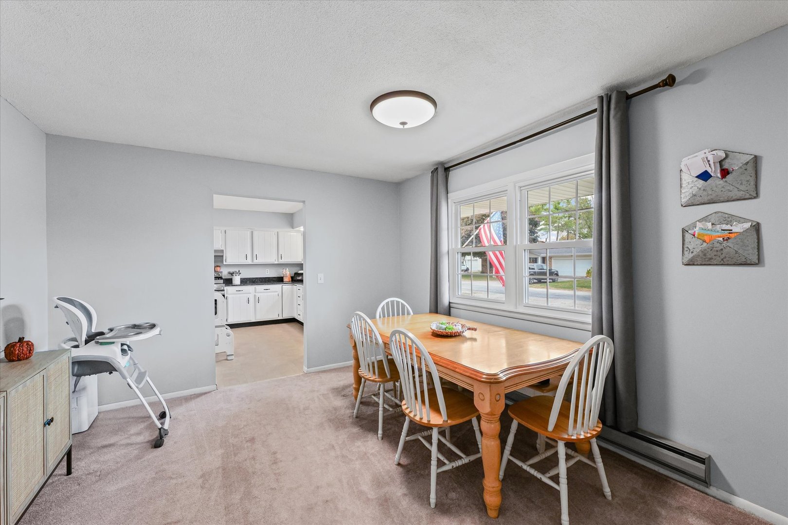 407 Church Street Royal, IL 61871 - Photo 10 of 31 a dining room with furniture and window