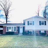 a view of a yard in front of a house