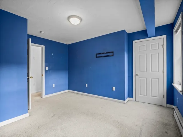 a bathroom with a sink vanity and a mirror