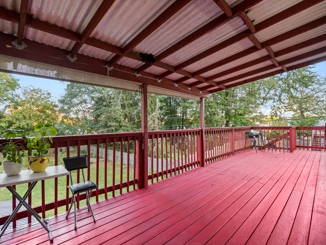 a view of backyard with a small cabin