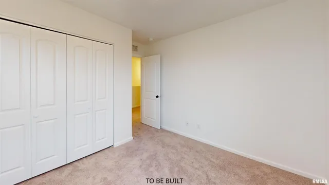 a view of a kitchen with kitchen island a sink stove a refrigerator and a window