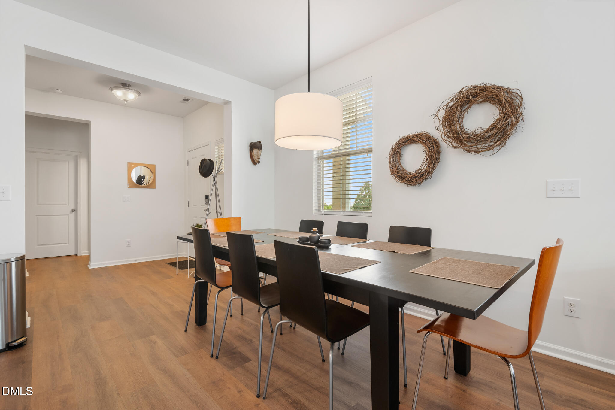 545 Libson Street Durham, NC 27703 - Photo 13 of 53 a view of a dining room with furniture and wooden floor