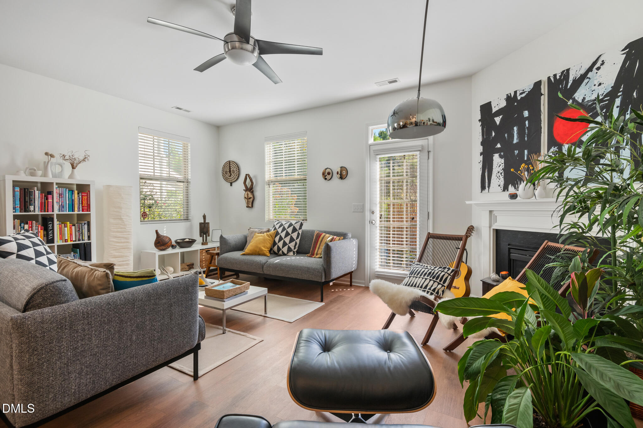 545 Libson Street Durham, NC 27703 - Photo 20 of 53 a living room with furniture ceiling fan and a rug