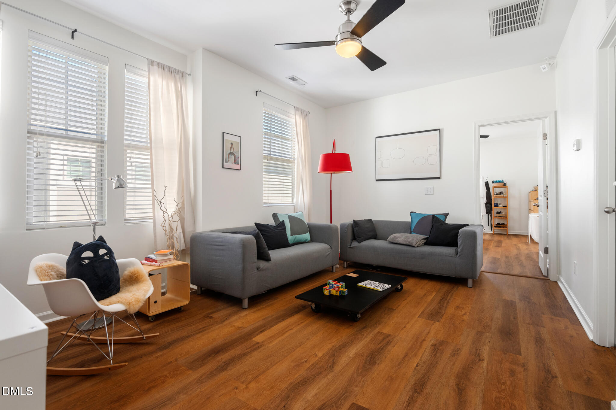 545 Libson Street Durham, NC 27703 - Photo 23 of 53 a living room with furniture and wooden floor