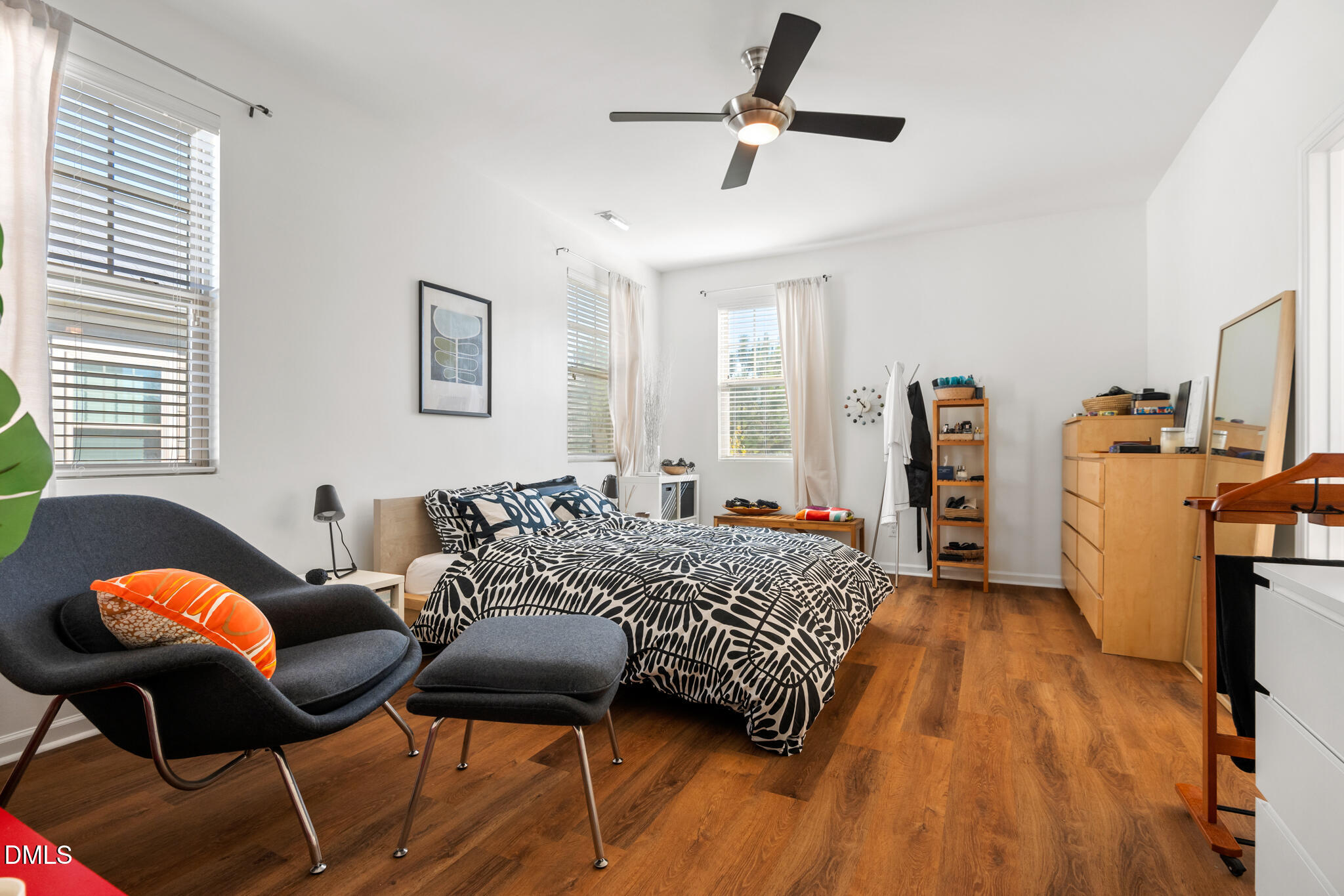 545 Libson Street Durham, NC 27703 - Photo 26 of 53 a bedroom with a bed and wooden floor