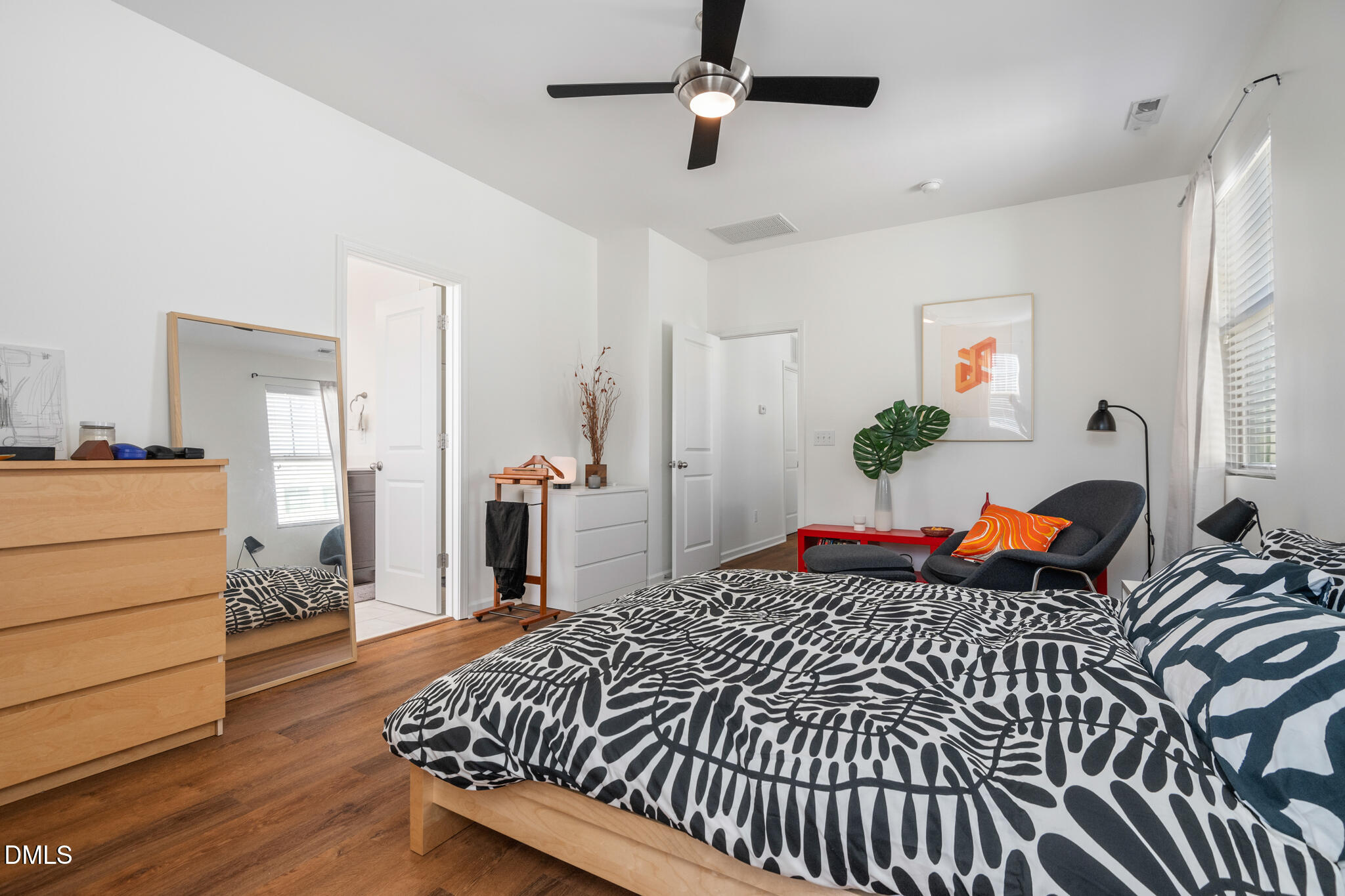 545 Libson Street Durham, NC 27703 - Photo 27 of 53 a bedroom with a bed and dresser