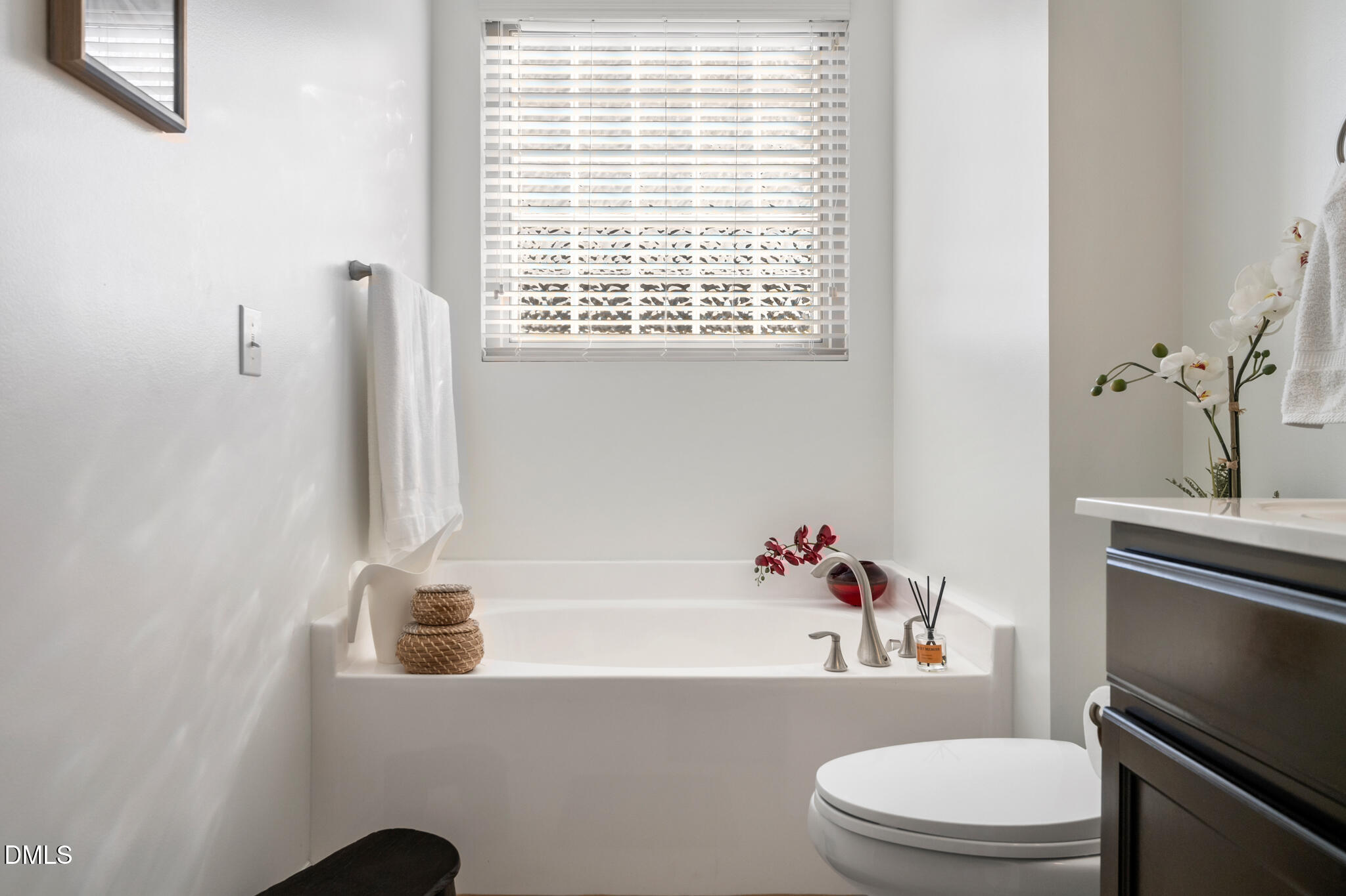 545 Libson Street Durham, NC 27703 - Photo 30 of 53 a white toilet sitting next to a bathroom sink