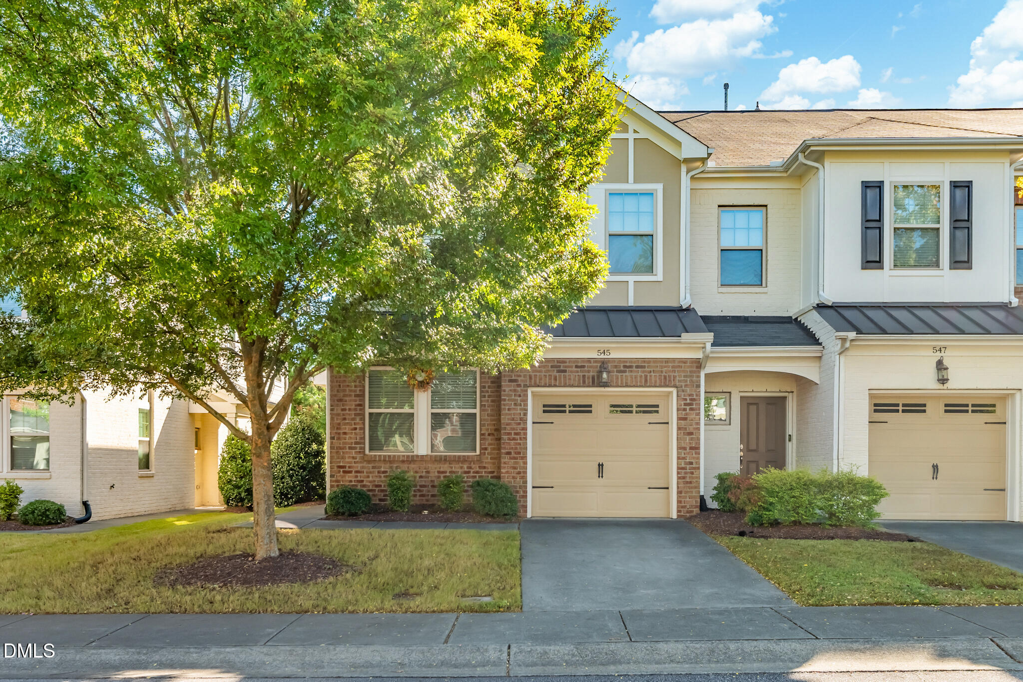 545 Libson Street Durham, NC 27703 - Photo 3 of 53 a front view of a house with a yard