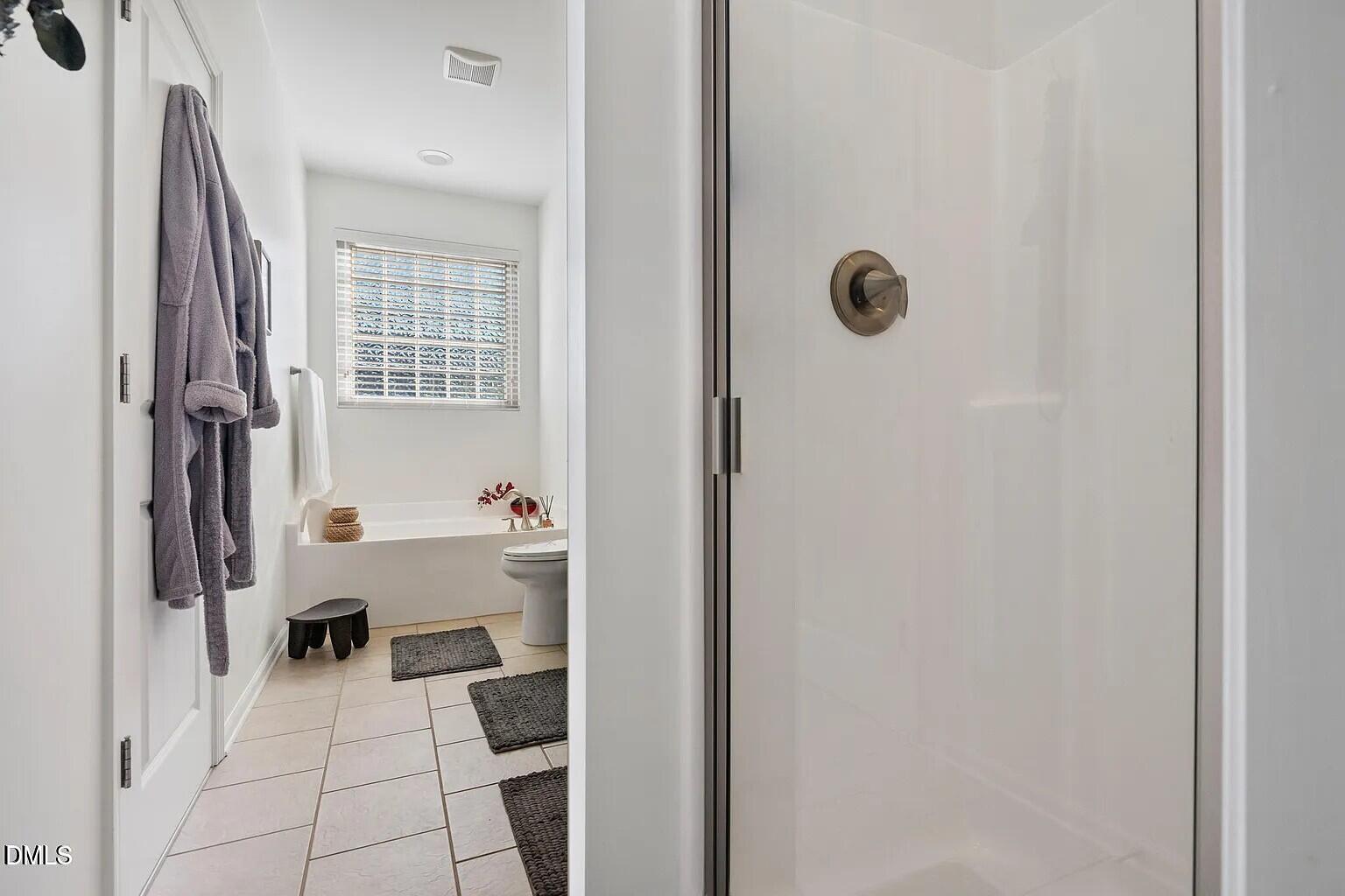 545 Libson Street Durham, NC 27703 - Photo 31 of 53 a view of a hallway with workspace and living room