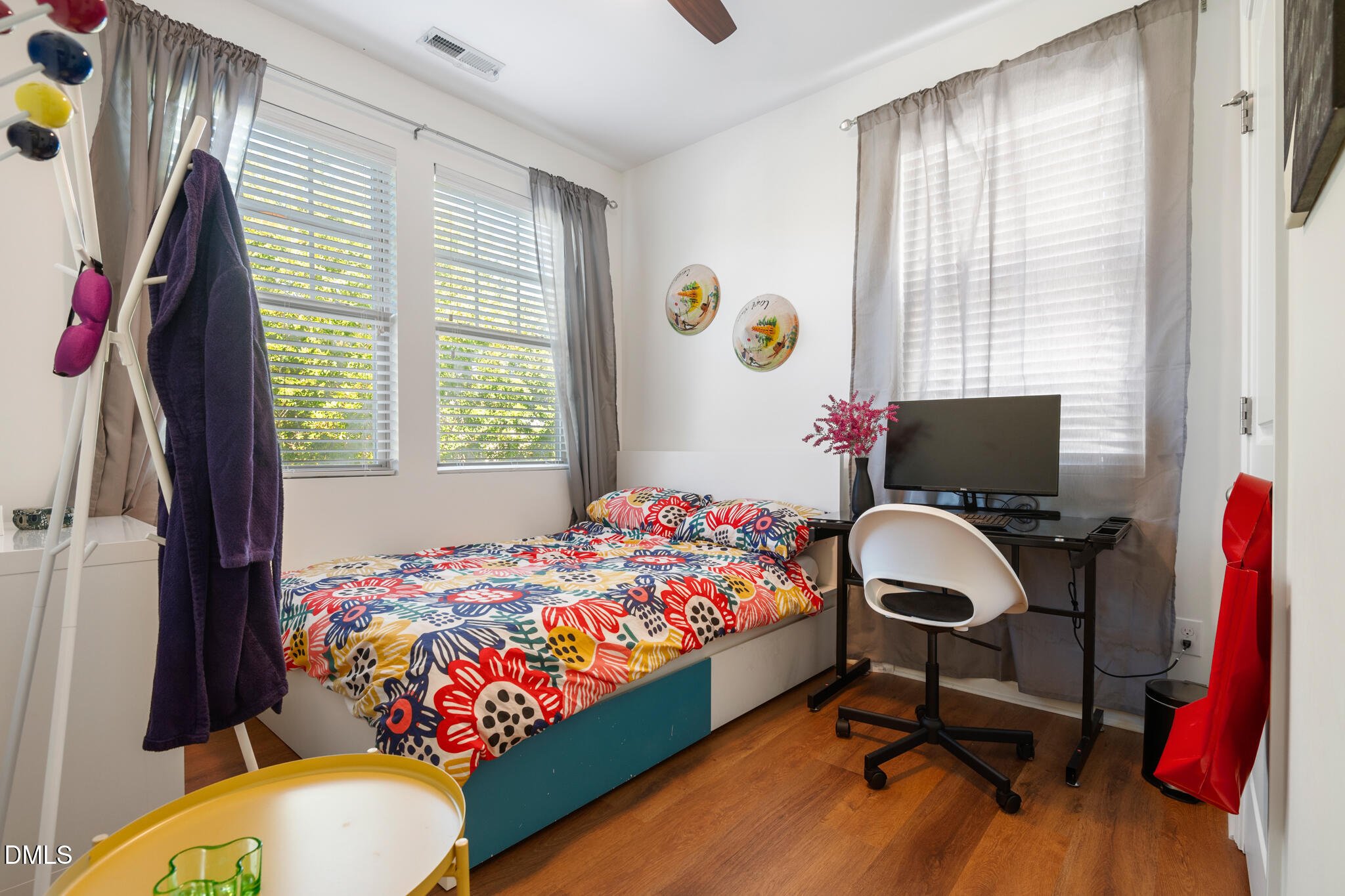 545 Libson Street Durham, NC 27703 - Photo 33 of 53 a bedroom with a bed and a window