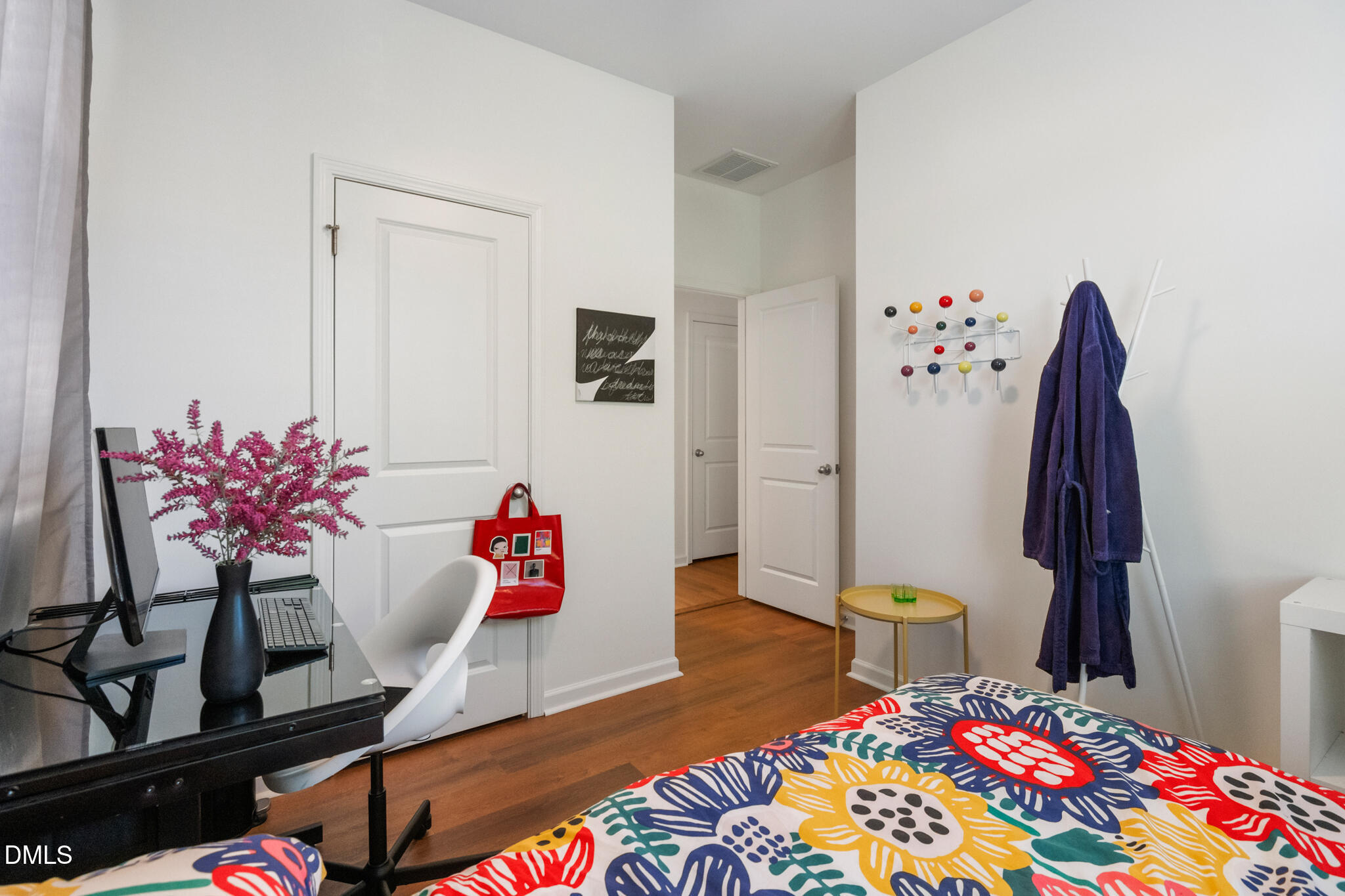 545 Libson Street Durham, NC 27703 - Photo 34 of 53 a living room with furniture and a wooden floor