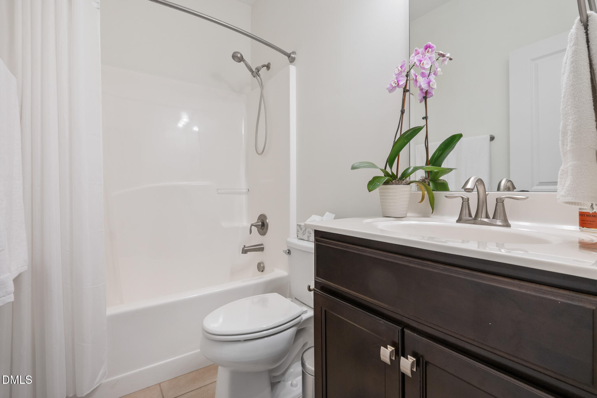 545 Libson Street Durham, NC 27703 - Photo 36 of 53 a bathroom with a sink a toilet and shower