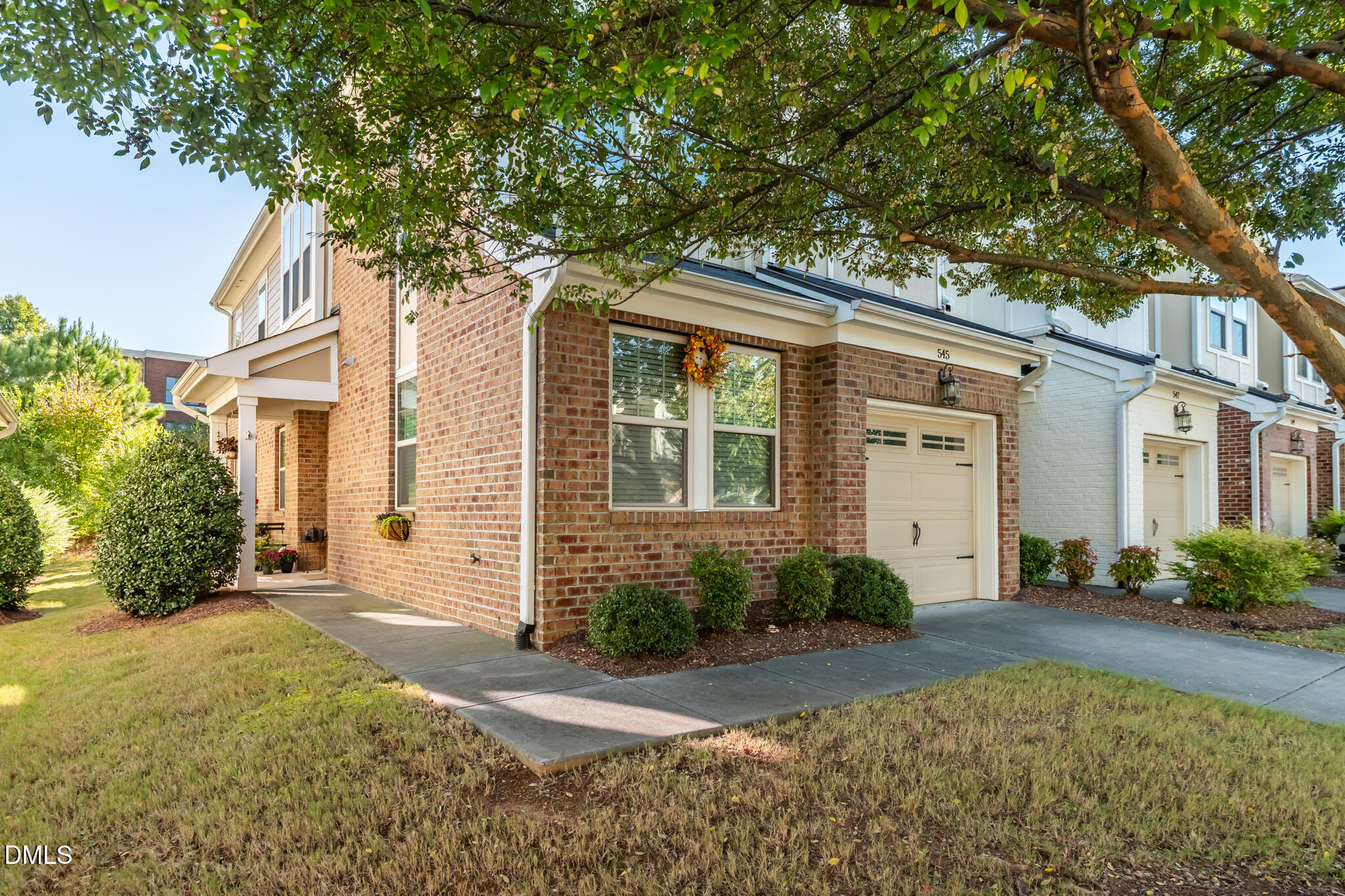 545 Libson Street Durham, NC 27703 - Photo 4 of 53 a front view of a house with garden