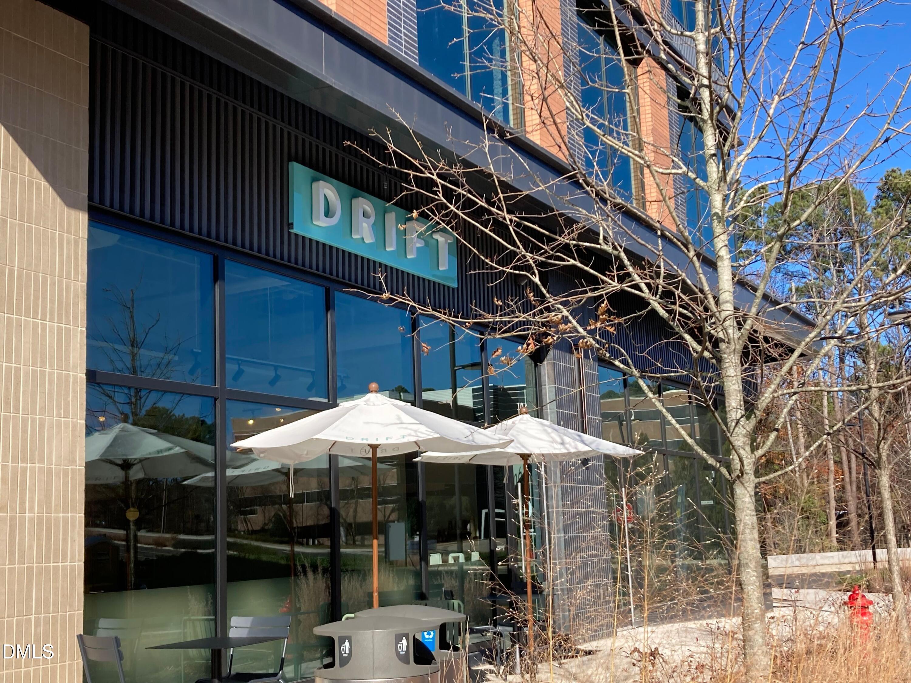 545 Libson Street Durham, NC 27703 - Photo 52 of 53 a table and chairs under an umbrella