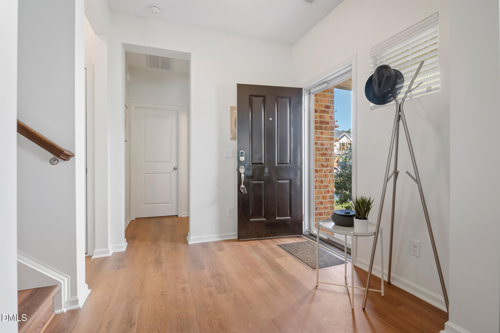 545 Libson Street Durham, NC 27703 - Photo 7 of 53 a view of entryway with wooden floor