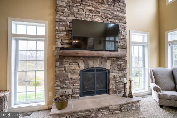 a kitchen with stainless steel appliances granite countertop a stove a sink and a granite counter tops