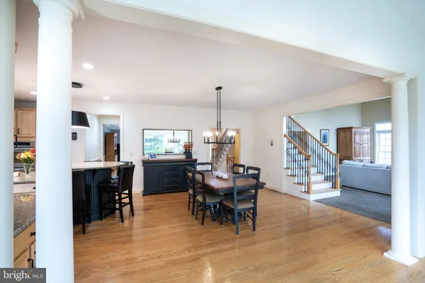 a bathroom with a sink toilet and a mirror