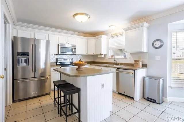 $420,000 | 5 Queen Victoria C Court, O'Fallon, MO 63366