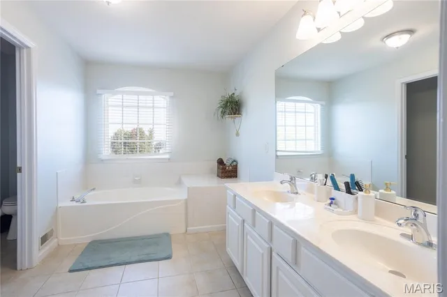 $420,000 | 5 Queen Victoria C Court, O'Fallon, MO 63366