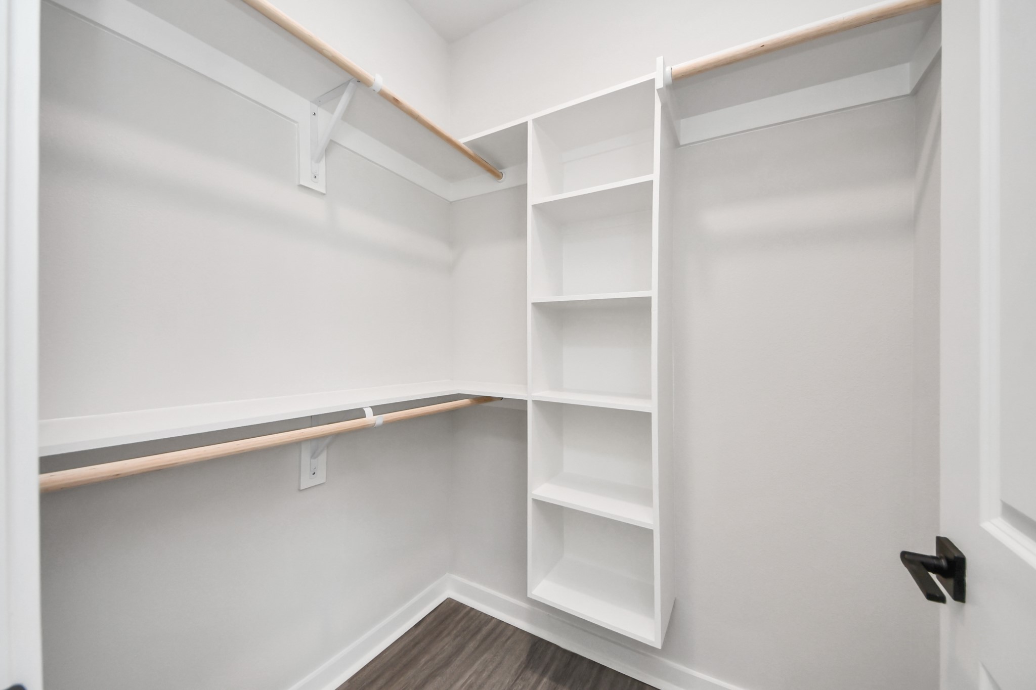 7711 Longmire Road, Unit 5 Conroe, TX 77304 - Photo 17 of 48 Primary Suite offers walk-closet,bath w/dual vanities&lux tub/shower.
