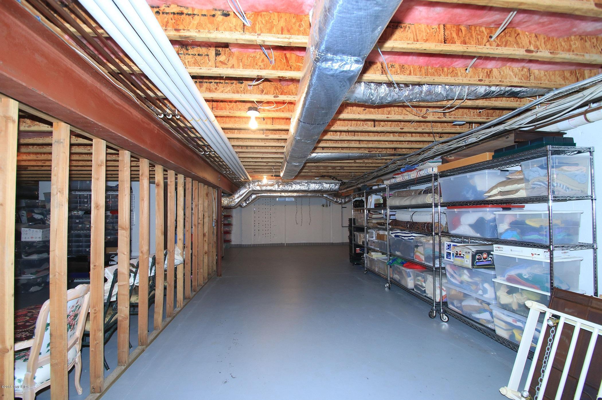 27 Chieftans Road Greenwich, CT 06831 - Photo 31 of 31 a view of an empty room with racks