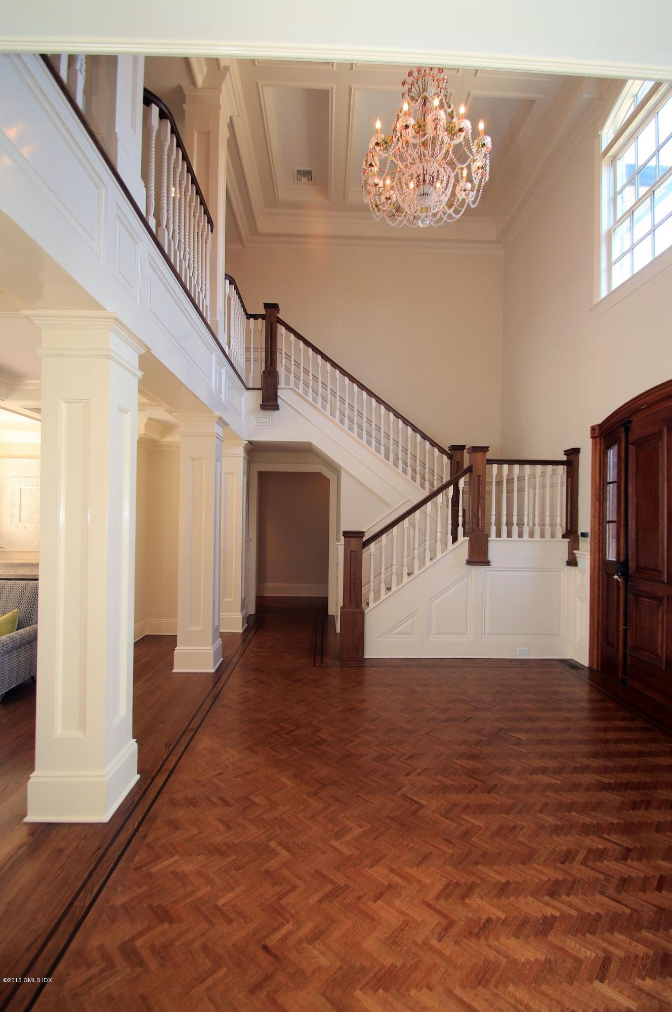 27 Chieftans Road Greenwich, CT 06831 - Photo 4 of 31 a view of entryway and hall with wooden floor