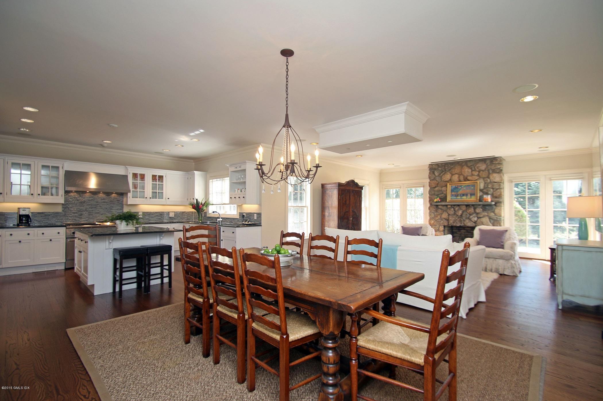 27 Chieftans Road Greenwich, CT 06831 - Photo 8 of 31 a dining room with furniture window and wooden floor