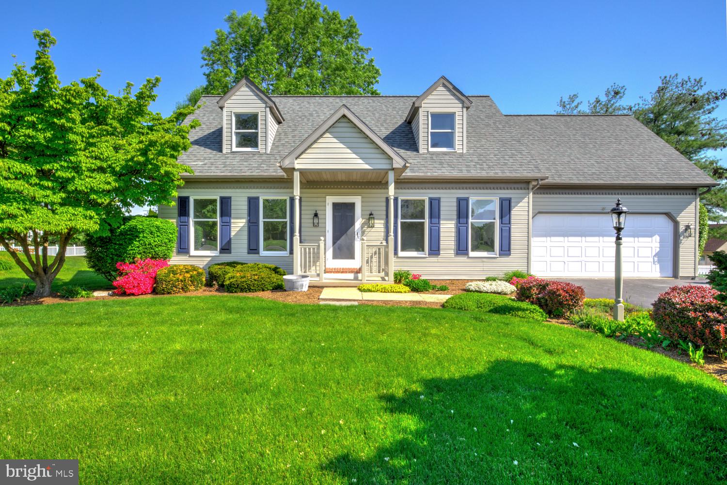 706 Rosemont Drive Lititz, PA 17543 - Photo 2 of 42 Charming home with lush greenery.