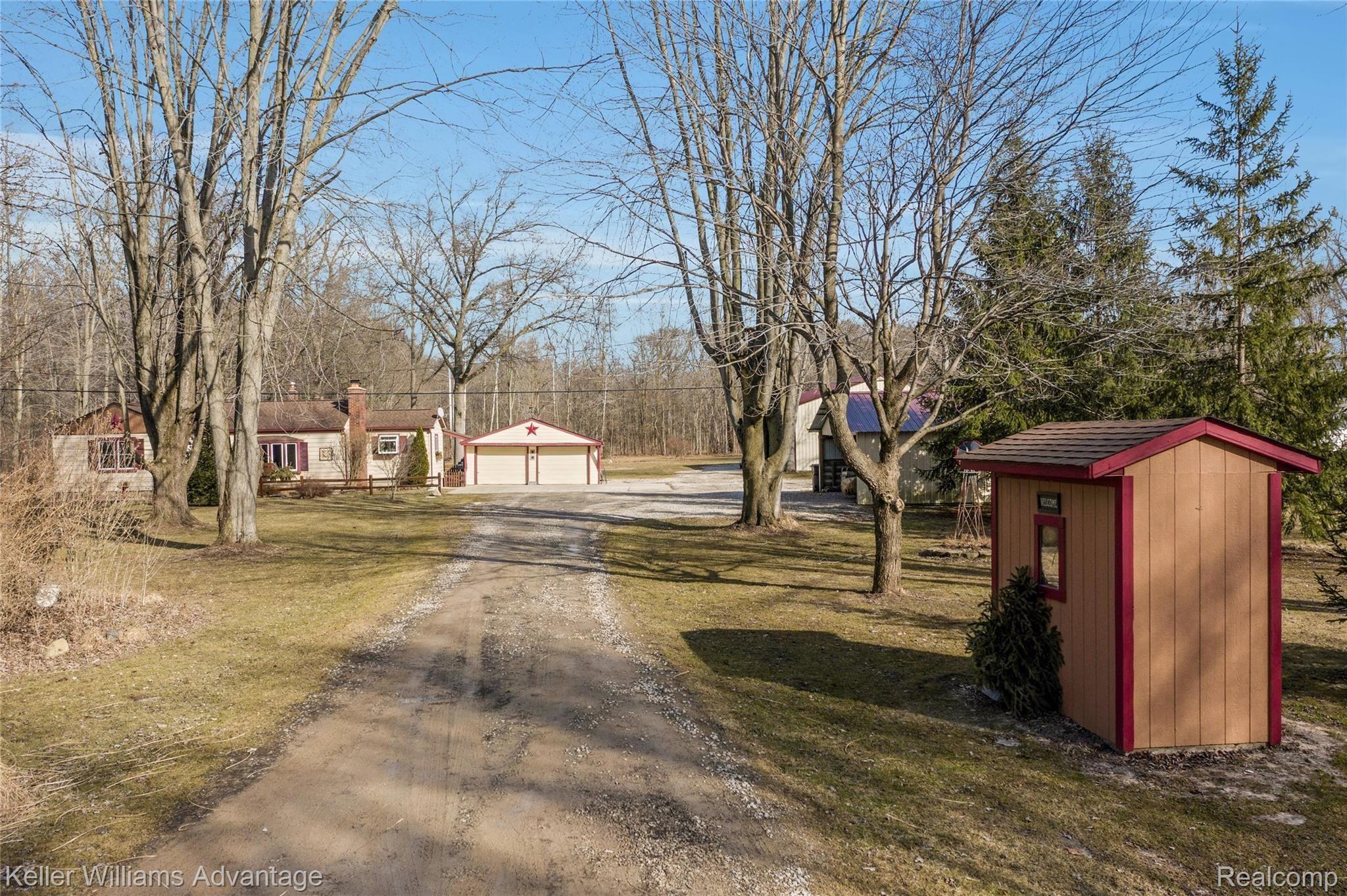 19731 Haggerty Road Belleville, MI 48111 - Photo 45 of 52 Adorable Bus-stop house / garden shed