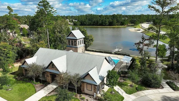 an aerial view of a house with balcony