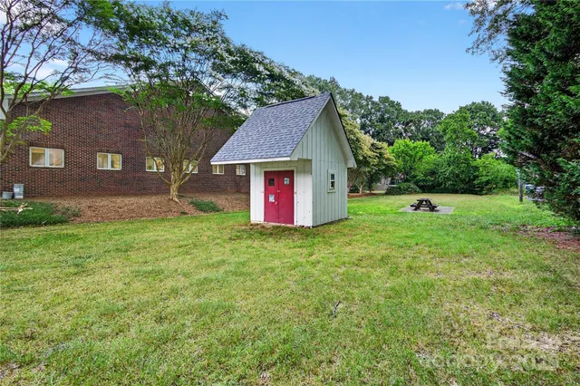 a view of a backyard with a garden
