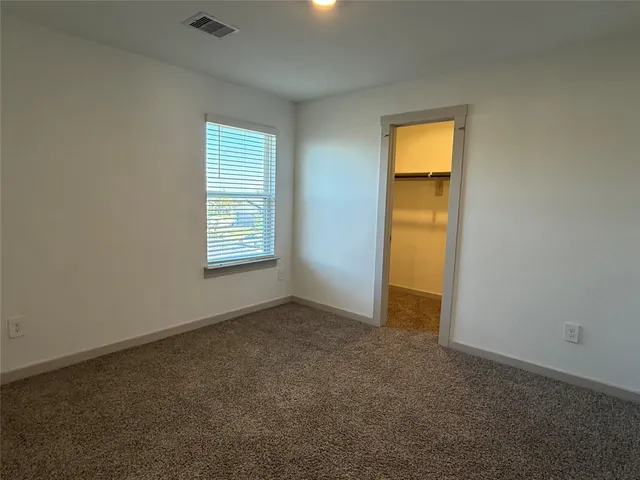 a bathroom with a sink double vanity and a mirror