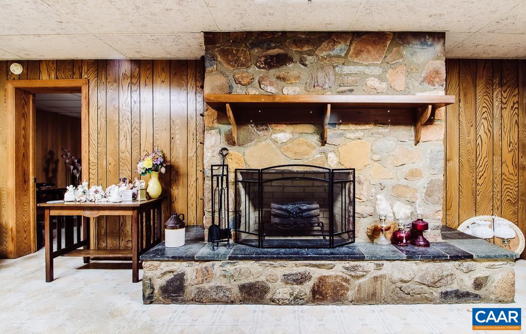 5742 Willow Spring Road Crozet, VA 22932 - Photo 1 of 34 a view of fireplace and front door