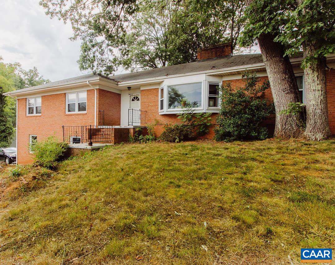 5742 Willow Spring Road Crozet, VA 22932 - Photo 2 of 34 a front view of a house with a yard