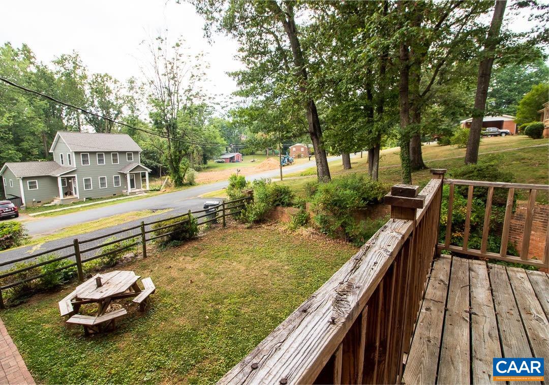 5742 Willow Spring Road Crozet, VA 22932 - Photo 26 of 34 a view of a house with backyard and sitting area