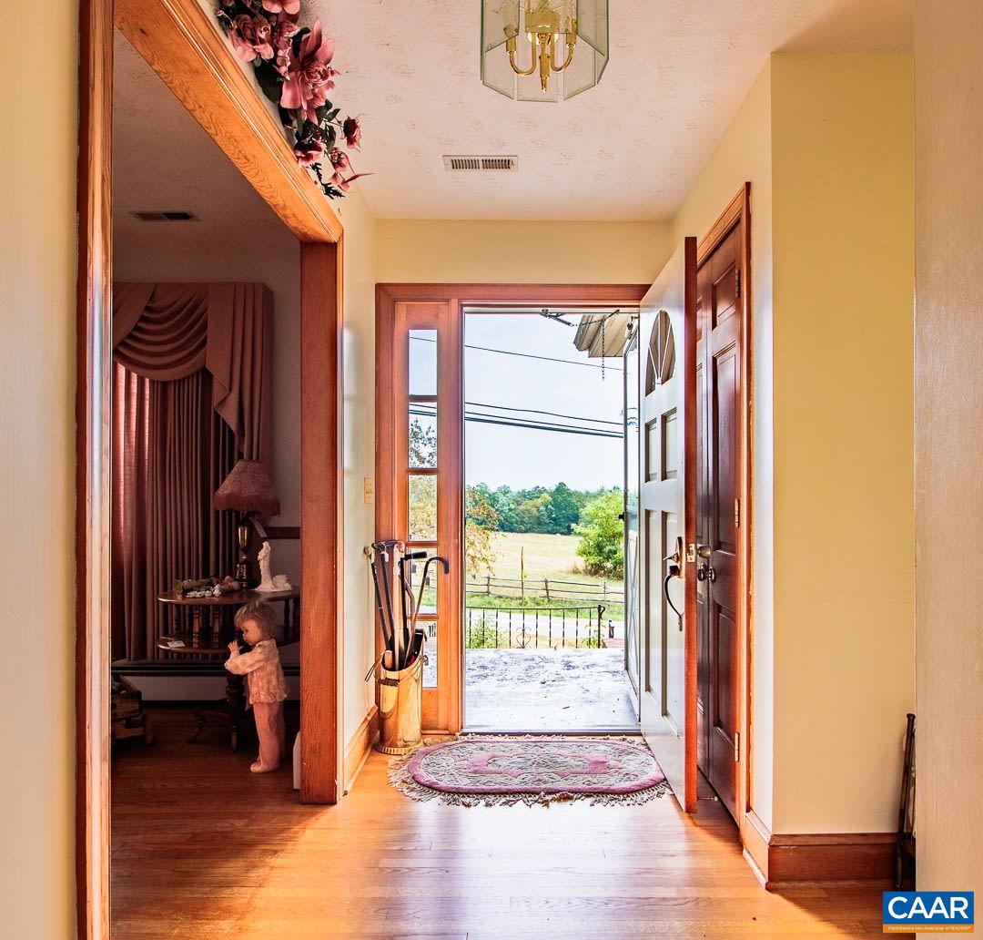 5742 Willow Spring Road Crozet, VA 22932 - Photo 3 of 34 a view of an entryway with wooden floor