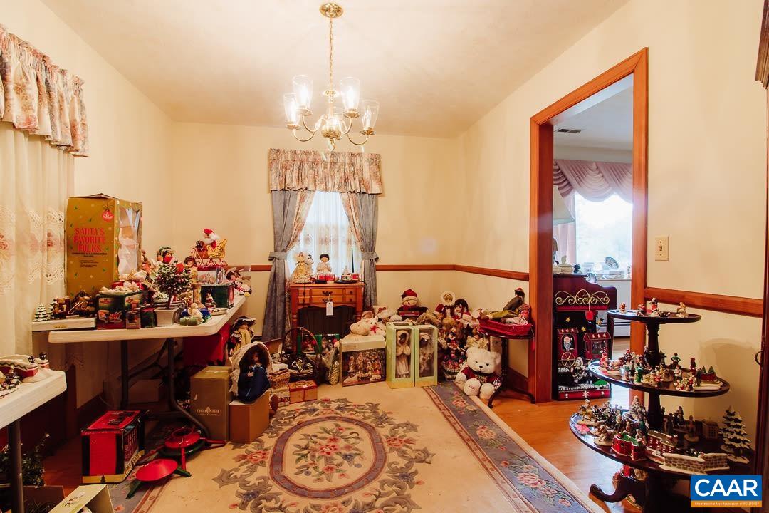5742 Willow Spring Road Crozet, VA 22932 - Photo 7 of 34 a very nice looking room with many windows