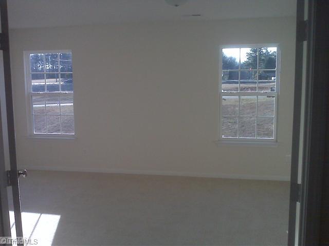 1328 Sharp Ridge Road Greensboro, NC 27406 - Photo 11 of 11 Bonus. This large bonus room with double doors could be a second Master bedroom on this floor plan, optional valuted ceiling, double sink tub/shower bath inside. The builder would be happy to build for you on the lot of your choosing with this special feature