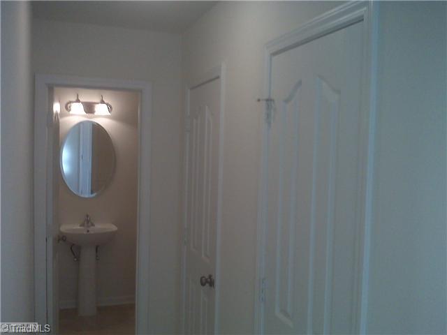 1328 Sharp Ridge Road Greensboro, NC 27406 - Photo 4 of 11 Other. Downstairs Half Bath you pass on the way to Kitchen.