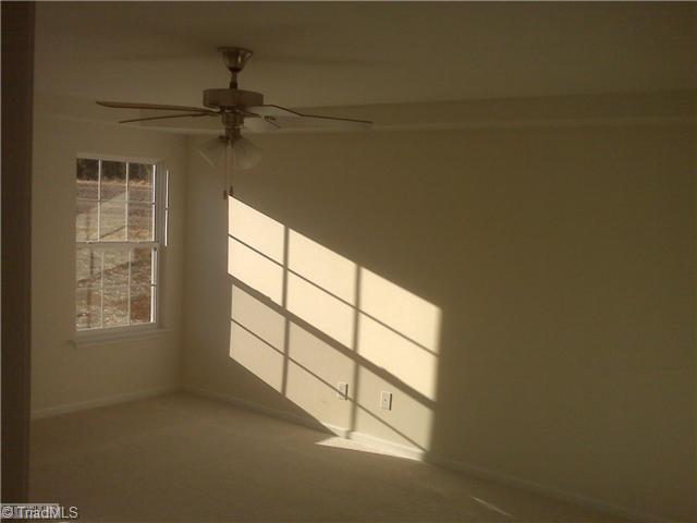 1328 Sharp Ridge Road Greensboro, NC 27406 - Photo 7 of 11 Master Bedroom. Downstairs Master bedroom with Tray ceiling and ceiling fan