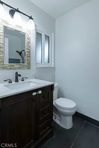 a bathroom with a sink and a toilet