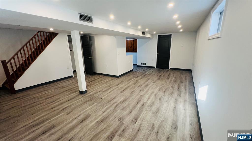 815 Highland Avenue Paramus, NJ 07652 - Photo 23 of 24 a view of a livingroom with wooden floor